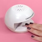 Flash-Dry-Nail-Fan-Lifestyle-hand-w-pink-BG-1